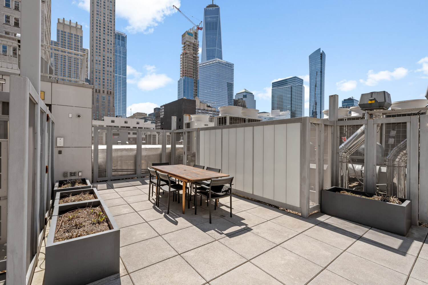 71 Reade Street, Unit 4C Manhattan, NY 10007 - Photo 11 of 12 a outdoor space with lots of chairs and a stove