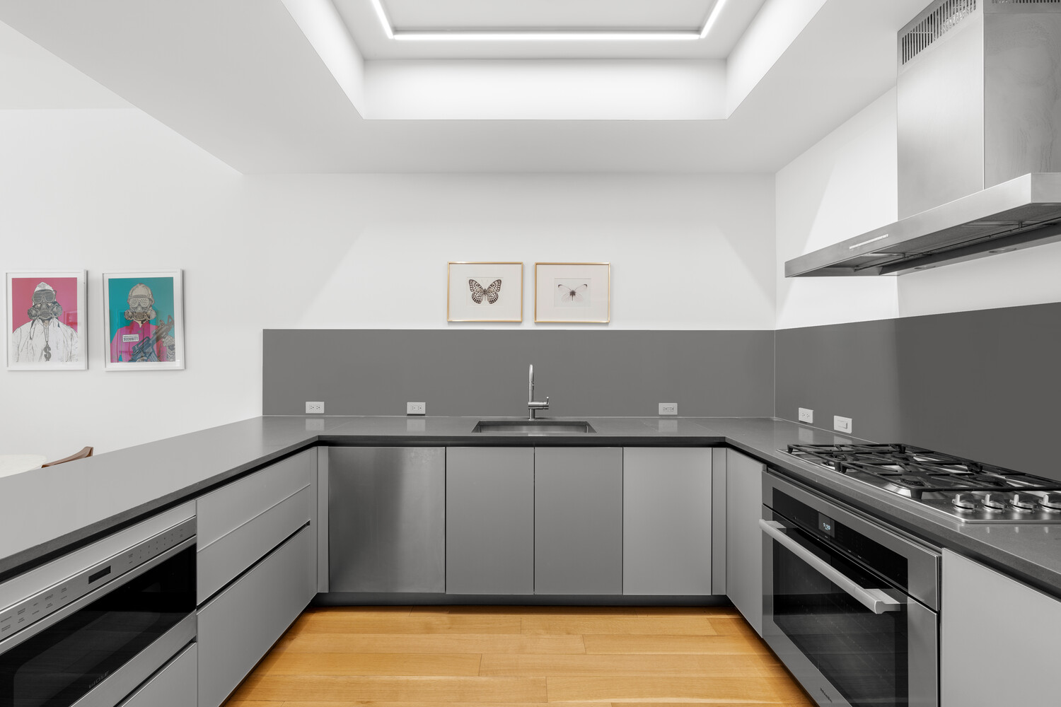 71 Reade Street, Unit 4C Manhattan, NY 10007 - Photo 2 of 12 a view of a kitchen with a stove top oven
