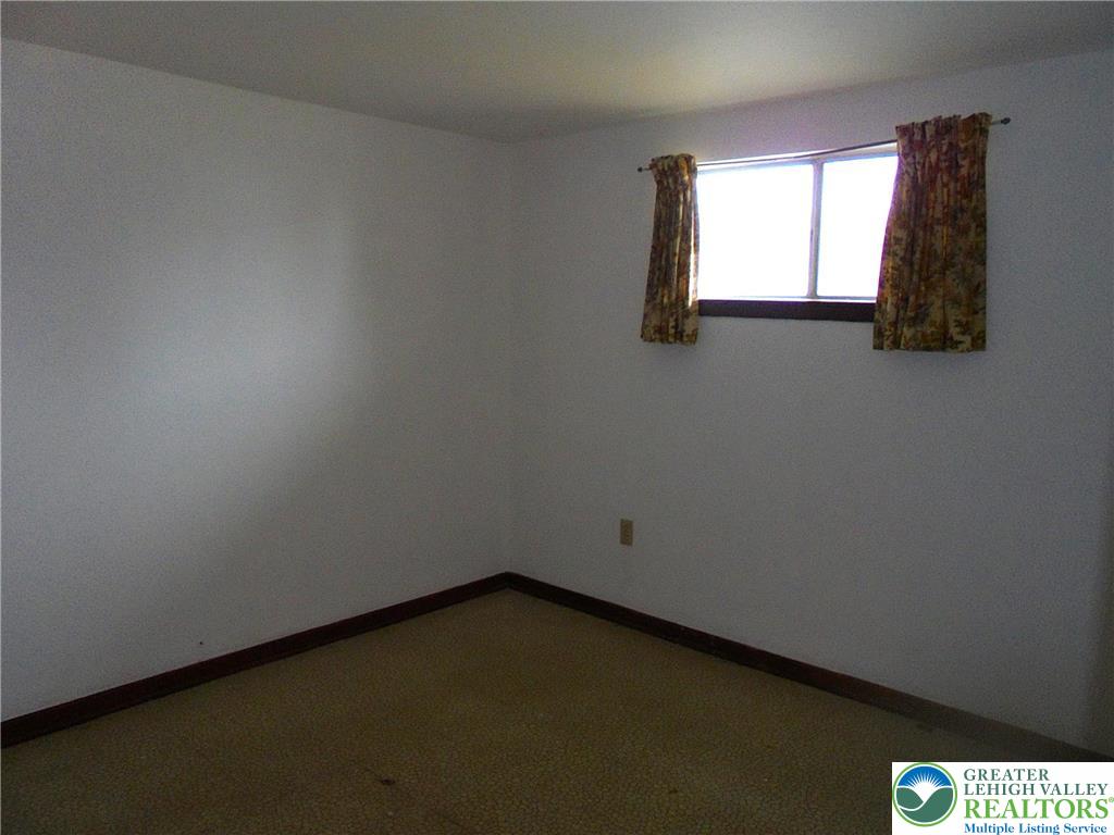 1217 Salisbury Road Allentown, PA 18103 - Photo 18 of 21 an empty room with a window