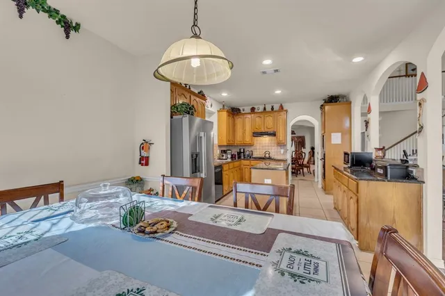 a view of a dining room with furniture