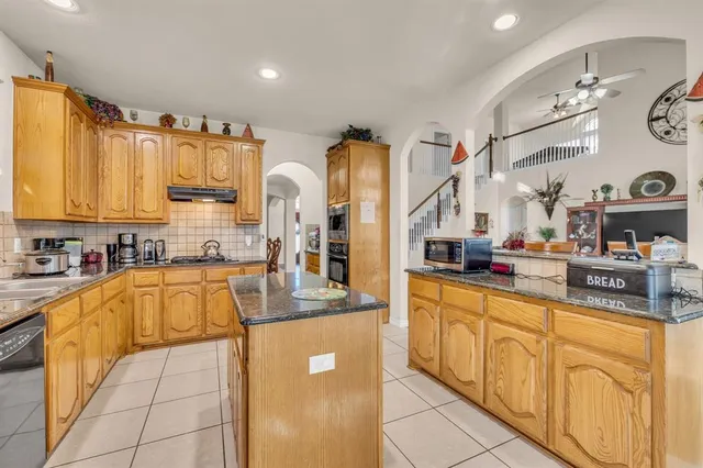 a large kitchen with cabinets
