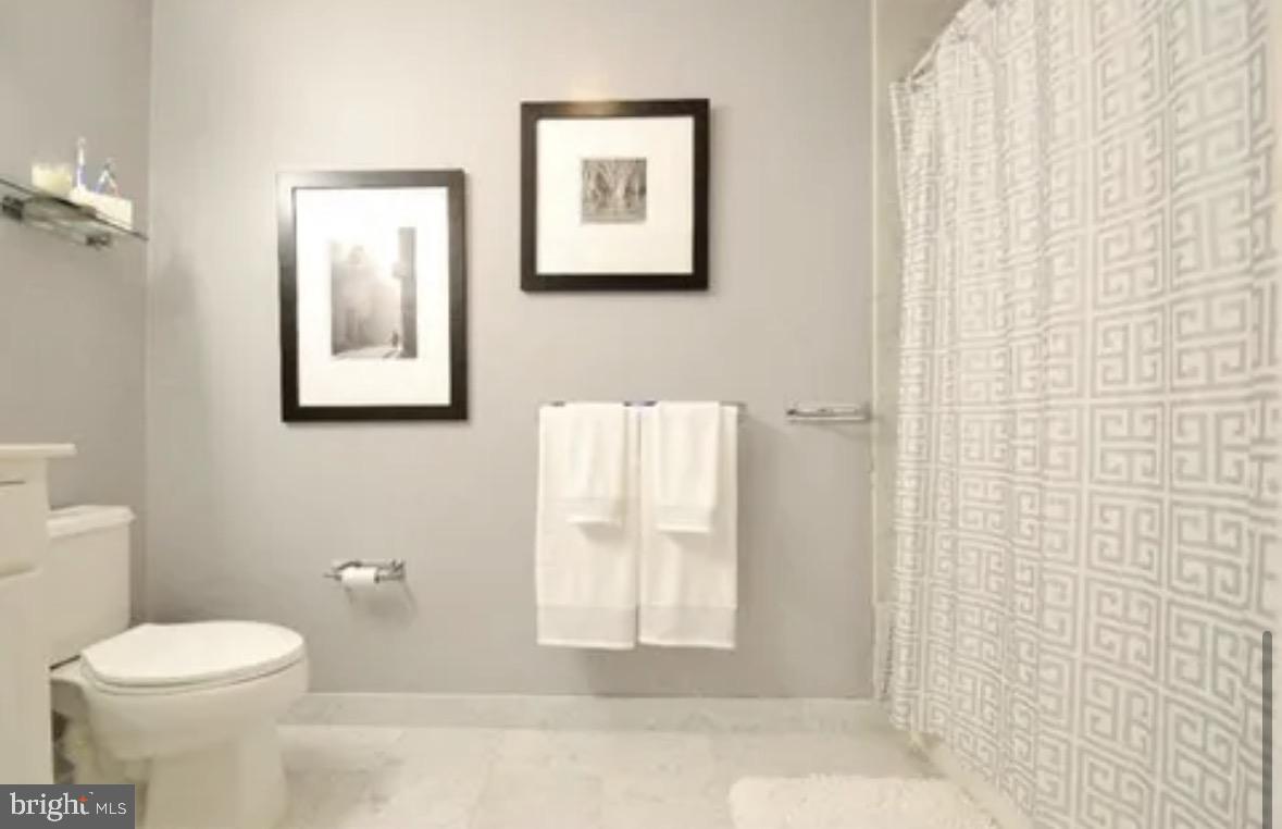 1500 Chestnut Street, Unit 4D Philadelphia, PA 19102 - Photo 16 of 26 Sleek and modern bathroom retreat.