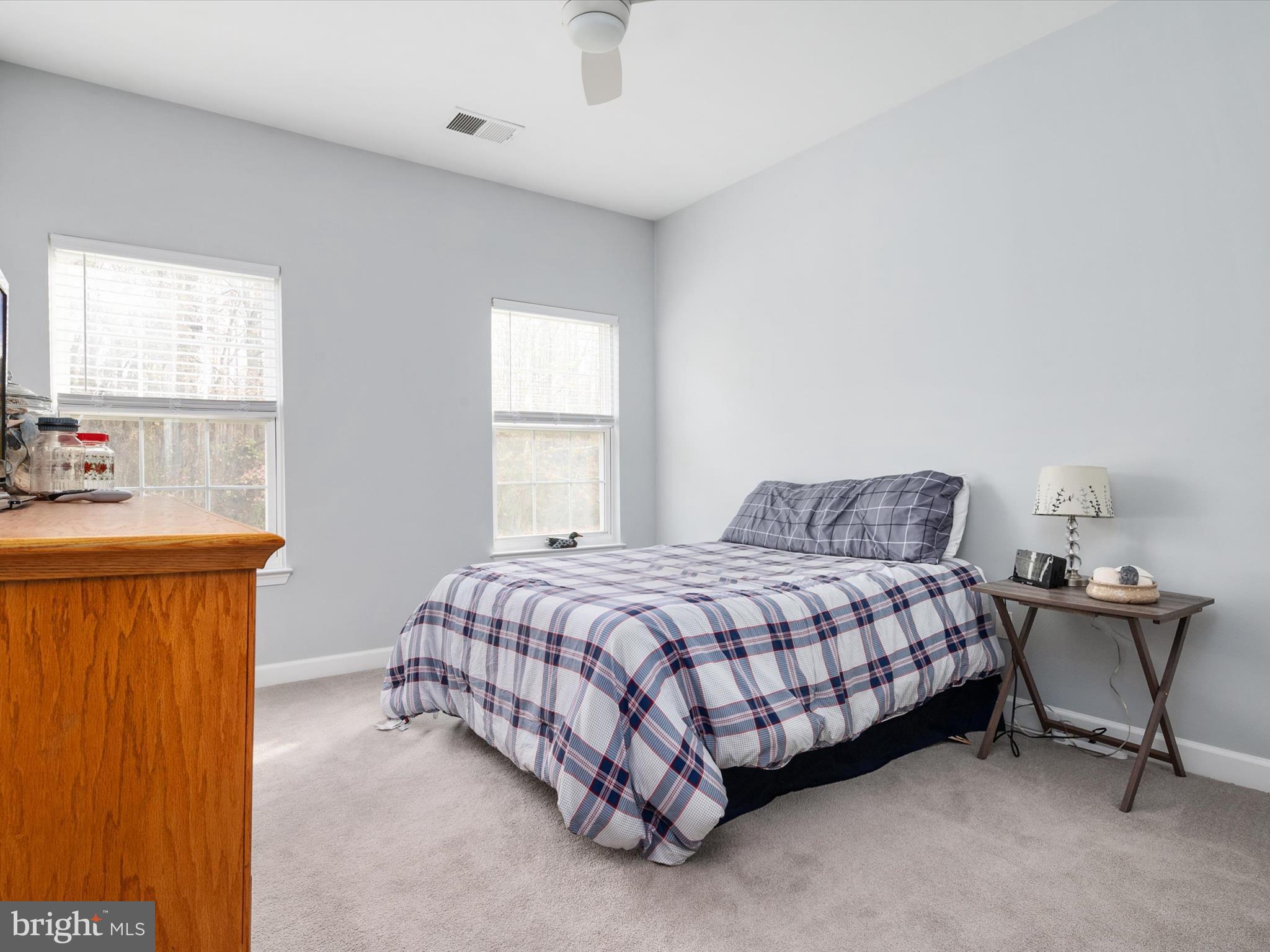 828 Duhamel Corner Road Marydel, MD 21649 - Photo 18 of 52 a bedroom with a bed and window