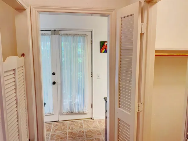 a view of a bathroom with wooden floor