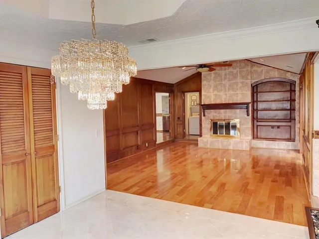 a view of livingroom with kitchen and dining room