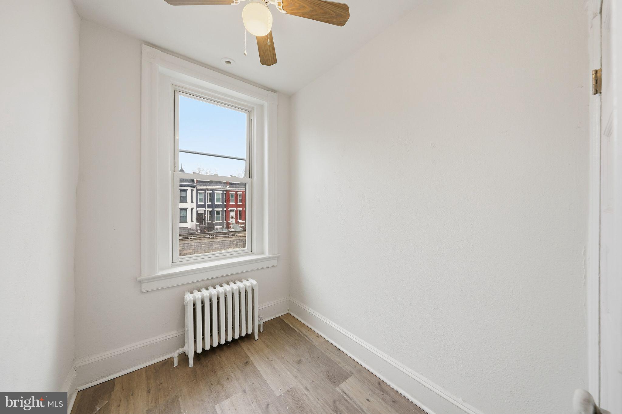 2032 North Capitol Street Northwest, Unit 1 Washington, DC 20002 - Photo 12 of 14 an empty room with a window