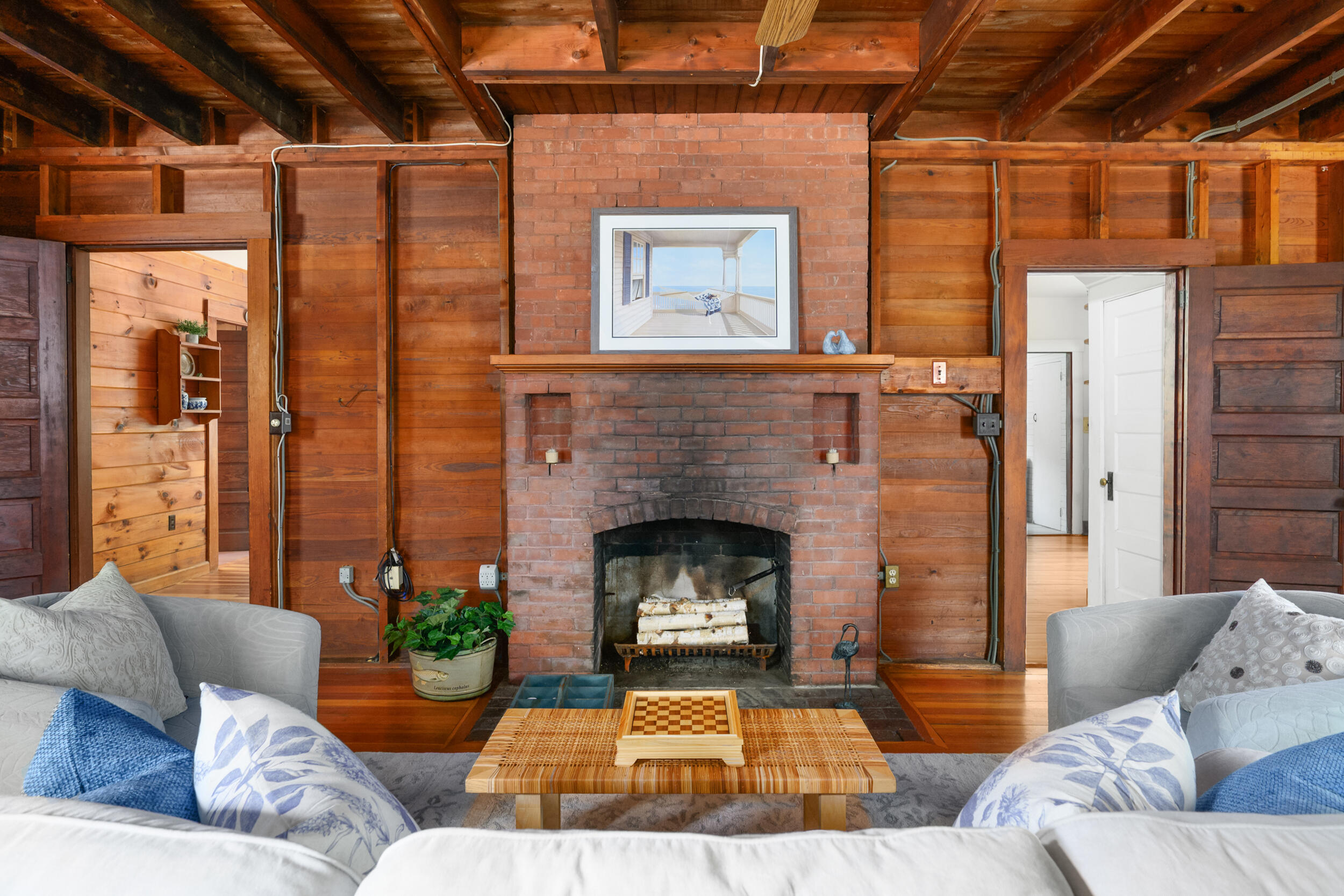 149 Cathedral Road Brewster, MA 02631 - Photo 6 of 53 Fireplace and doors to DR and Kitchen