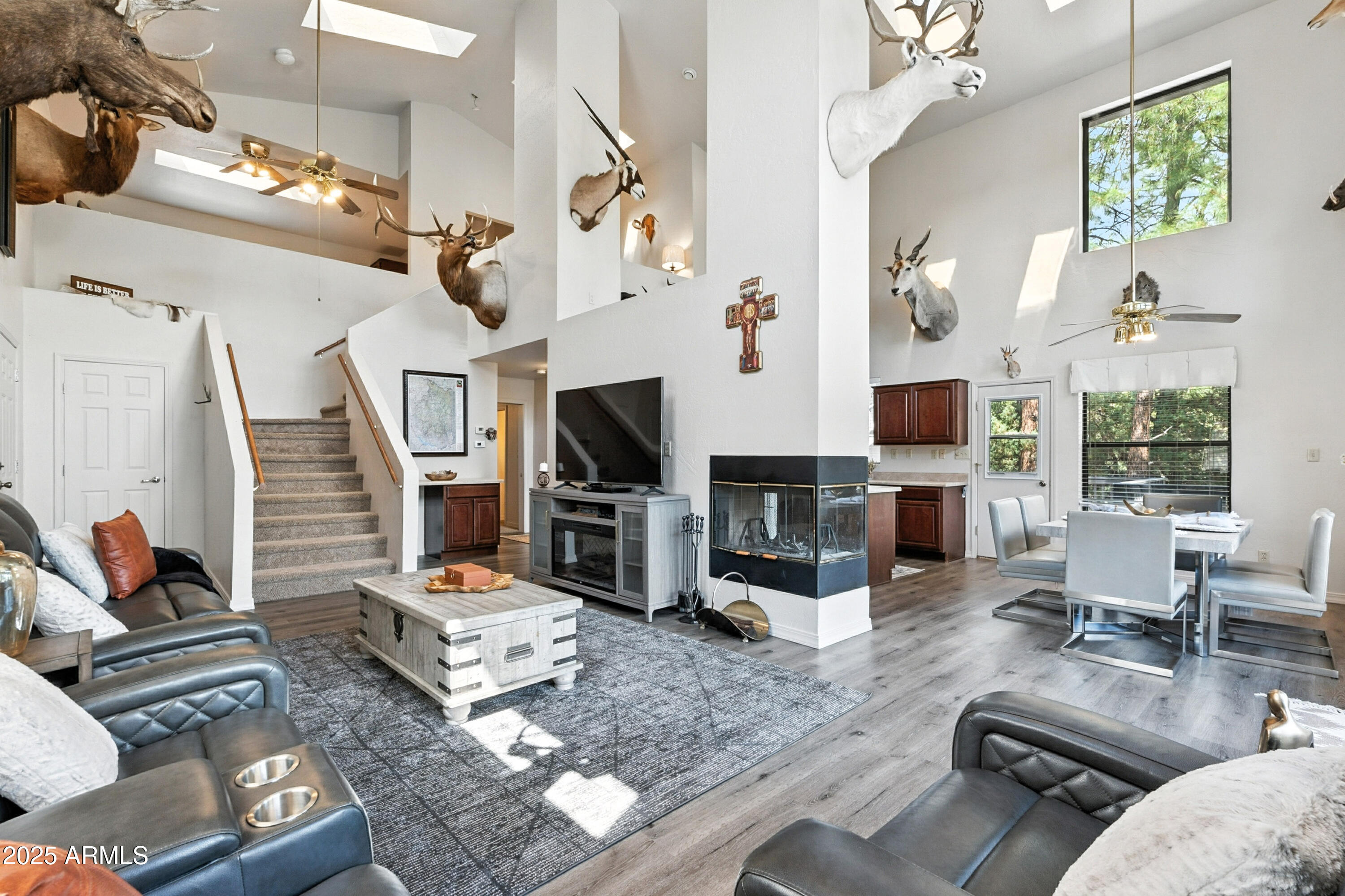 199 South Greystone Circle Payson, AZ 85541 - Photo 13 of 83 a living room with fireplace furniture and a flat screen tv