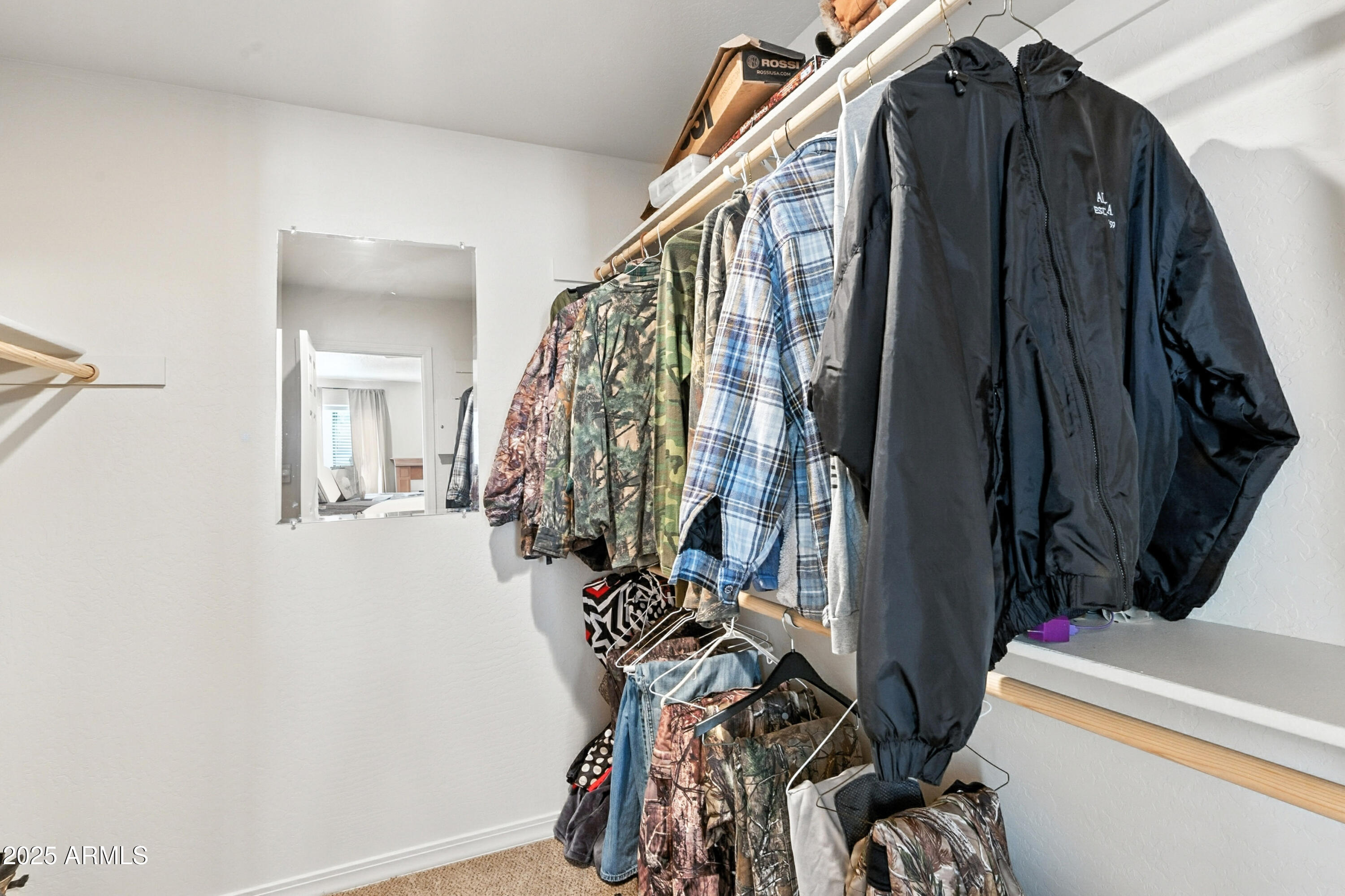 199 South Greystone Circle Payson, AZ 85541 - Photo 30 of 83 a view of walk in closet with clothes