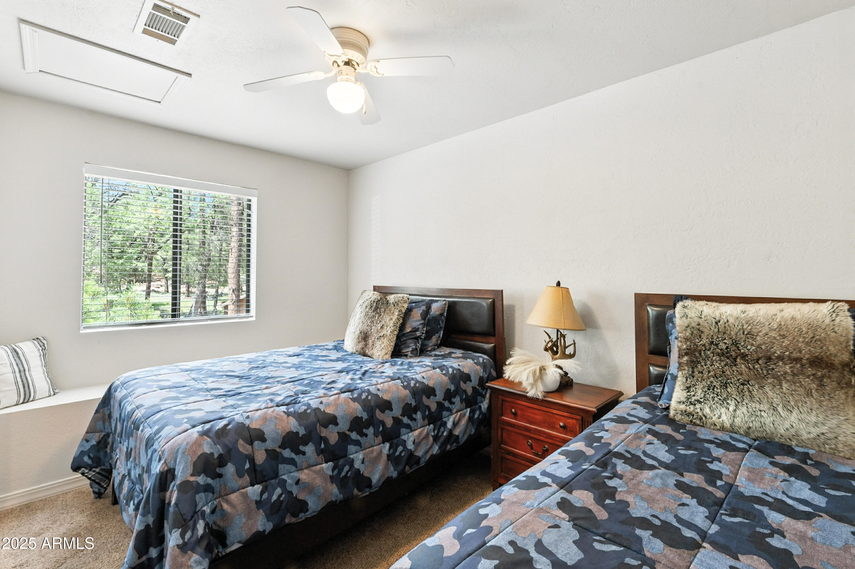 199 South Greystone Circle Payson, AZ 85541 - Photo 40 of 83 a bedroom with a bed and a chandelier