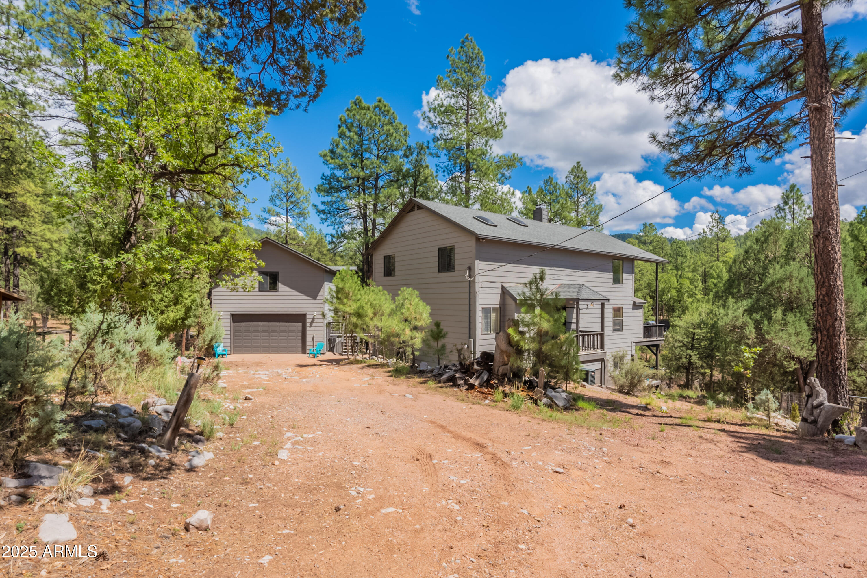 199 South Greystone Circle Payson, AZ 85541 - Photo 5 of 83 a view of a house with a small yard and a large tree