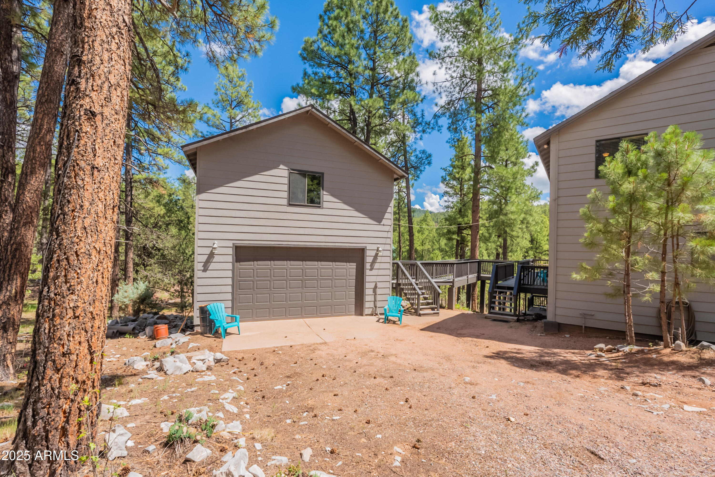 199 South Greystone Circle Payson, AZ 85541 - Photo 6 of 83 a front view of a house with a yard and garage