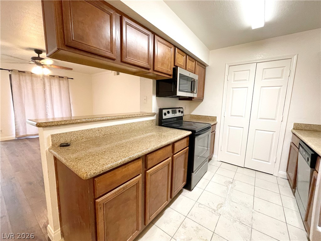 3135 South Mojave Road, Unit 221 Las Vegas, NV 89121 - Photo 6 of 19 A well-appointed kitchen features ample counter space and convenient appliance placement.