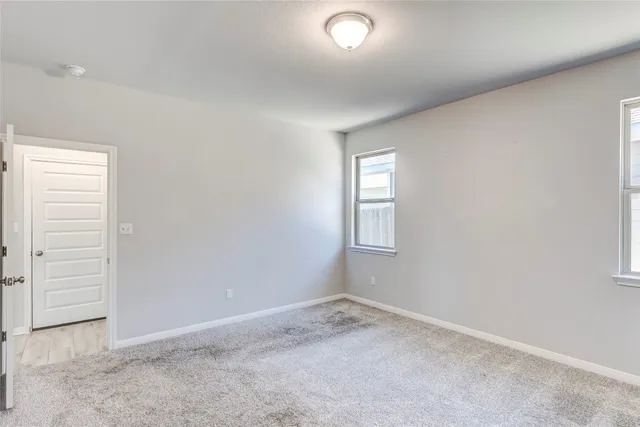 an empty room with closet
