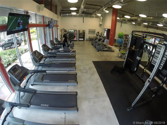 a view of a room with gym equipment