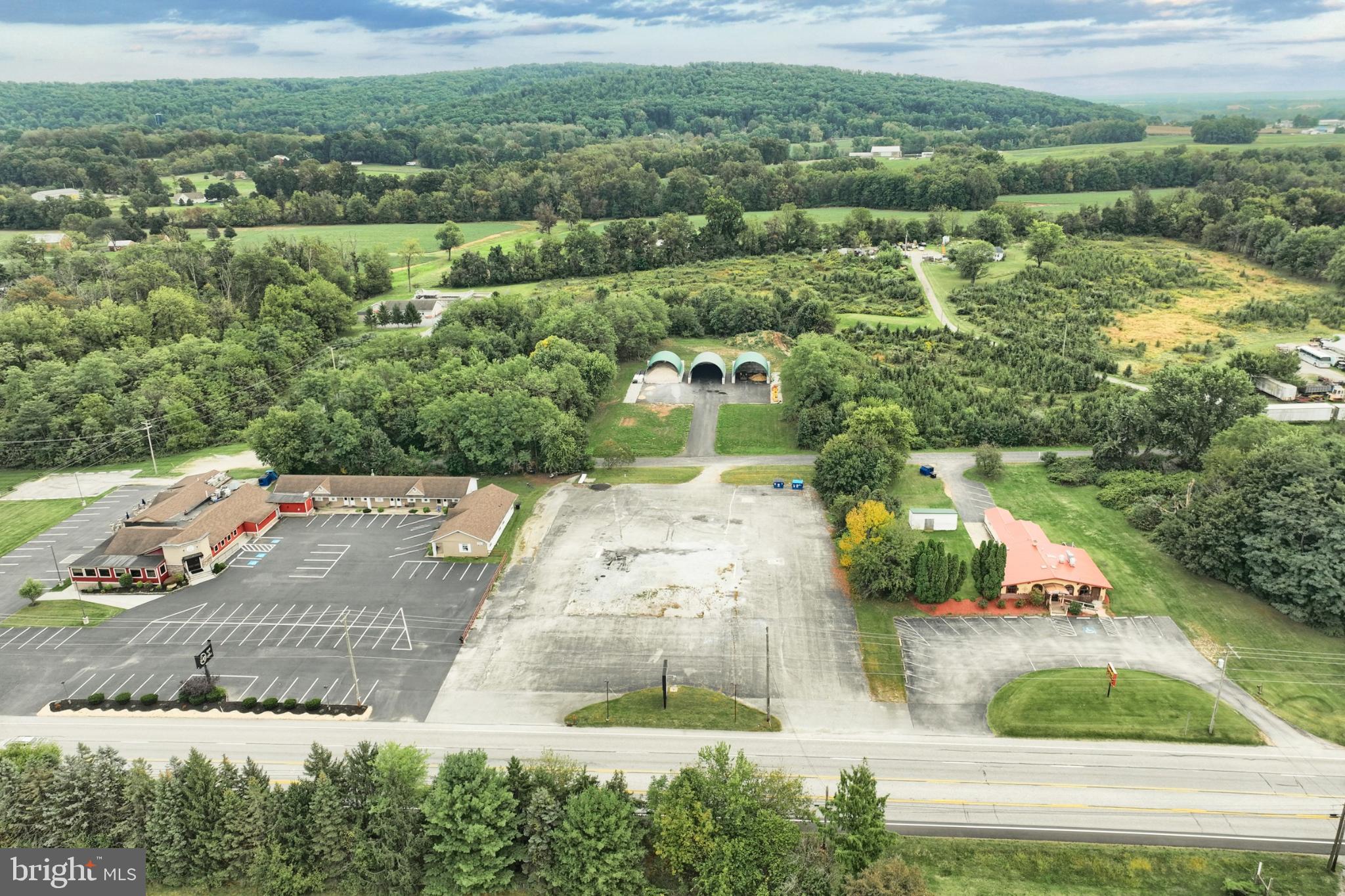 6431 York Road New Oxford, PA 17350 - Photo 2 of 13 an aerial view of a house with a yard