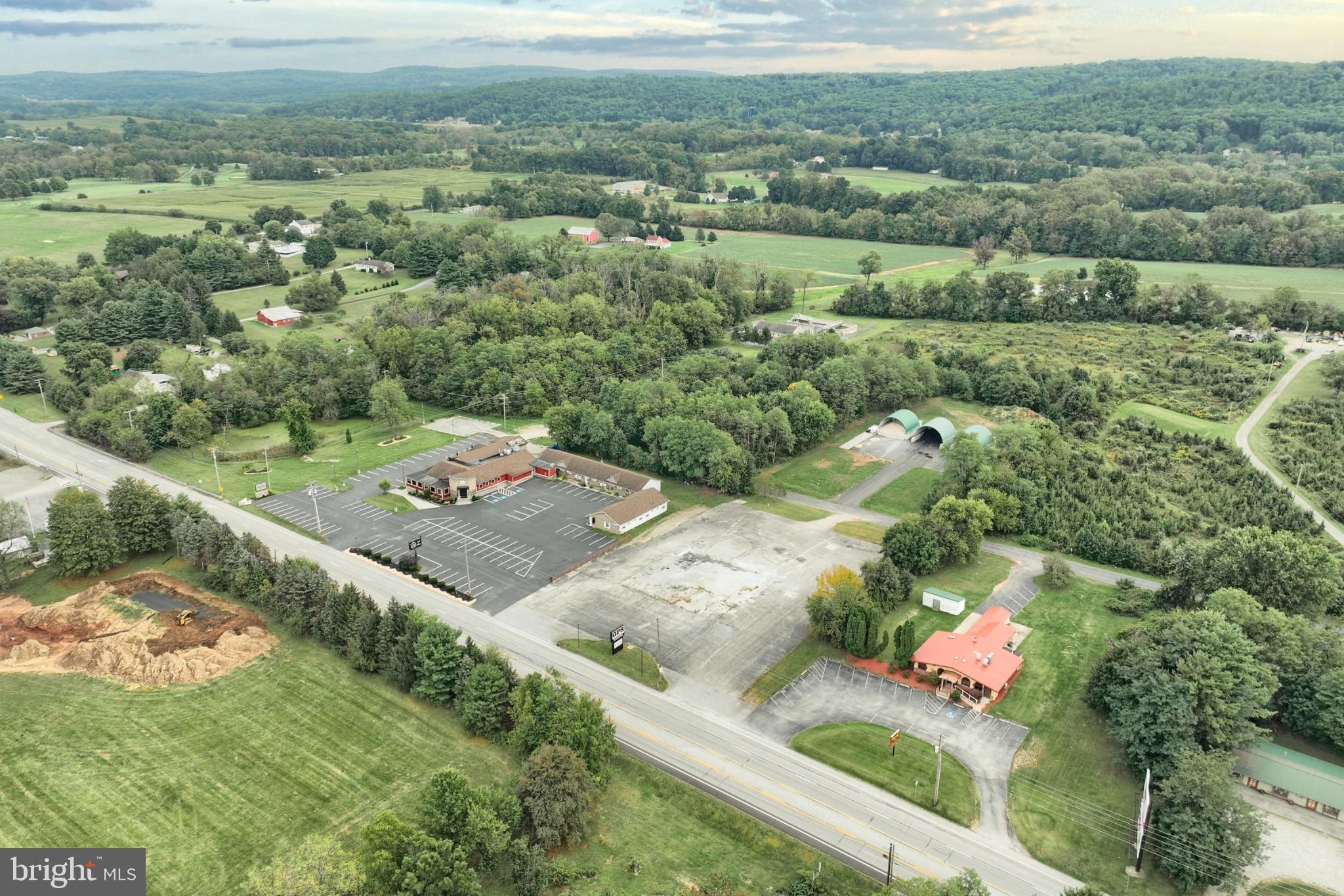 6431 York Road New Oxford, PA 17350 - Photo 10 of 13 an aerial view of a house with a yard
