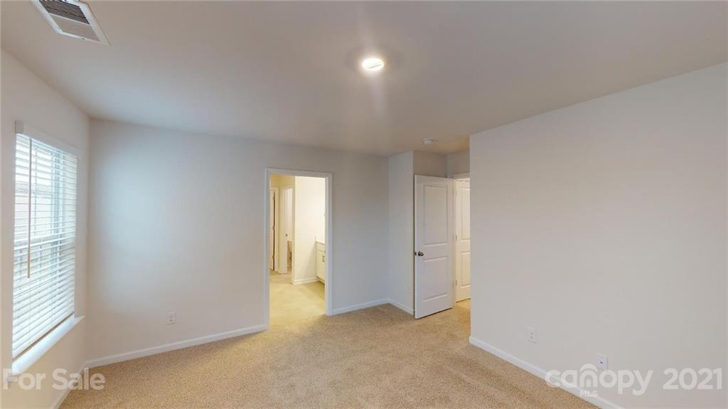 321 Gaines Road Clover, SC 29710 - Photo 14 of 43 an empty room with windows and closet