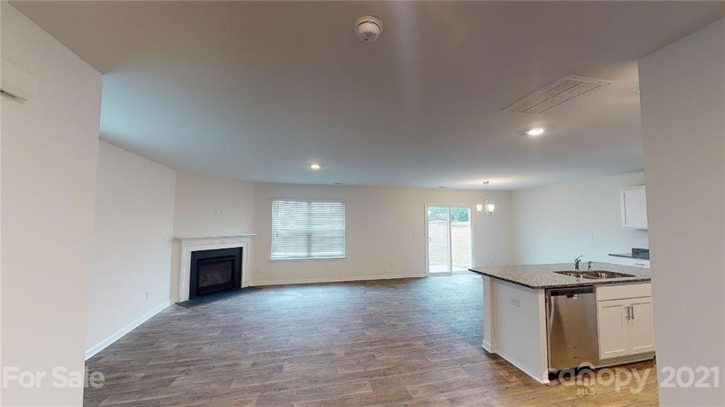 321 Gaines Road Clover, SC 29710 - Photo 3 of 43 a view of kitchen and hall with wooden floor