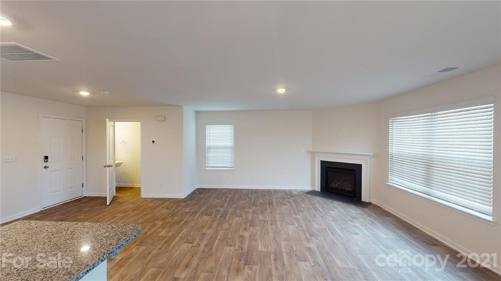 321 Gaines Road Clover, SC 29710 - Photo 5 of 43 a view of empty room with wooden floor and fan