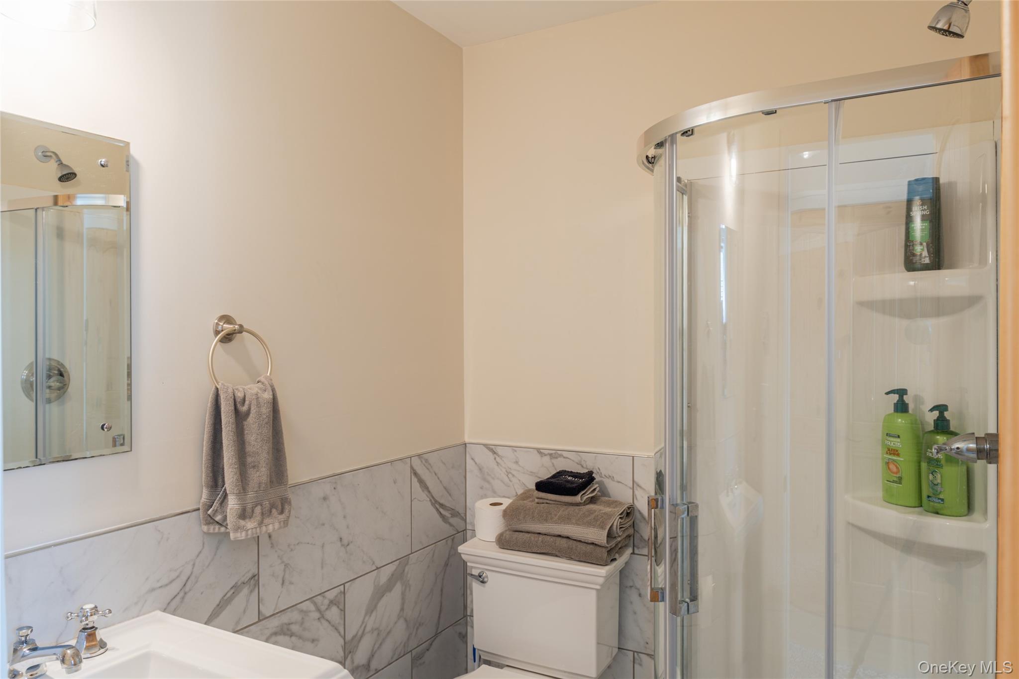 71 County Road 65, Unit 6 Windham, NY 12439 - Photo 15 of 38 a bathroom with a sink toilet and shower