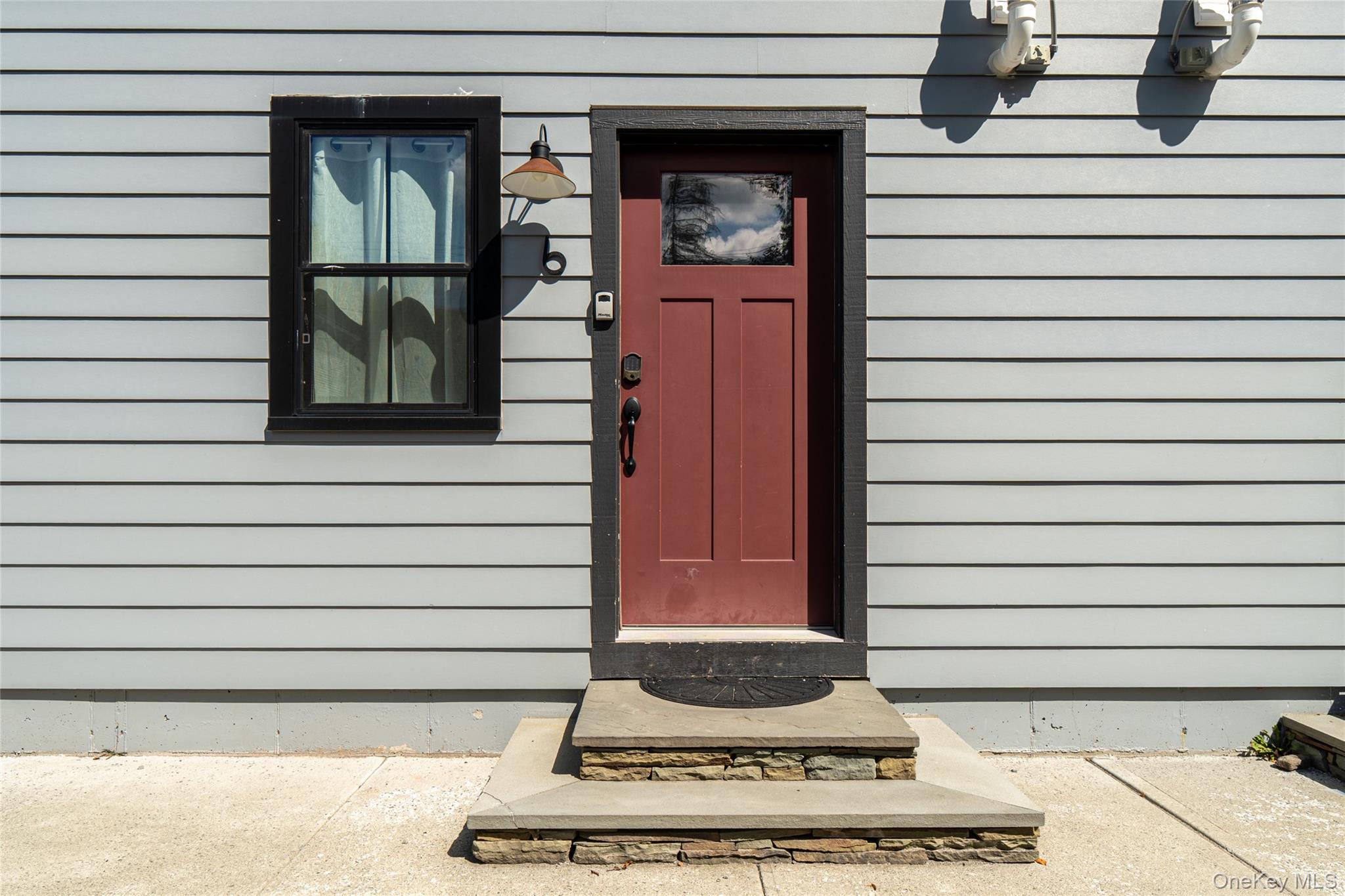 71 County Road 65, Unit 6 Windham, NY 12439 - Photo 35 of 38 a side view of a house with a porch