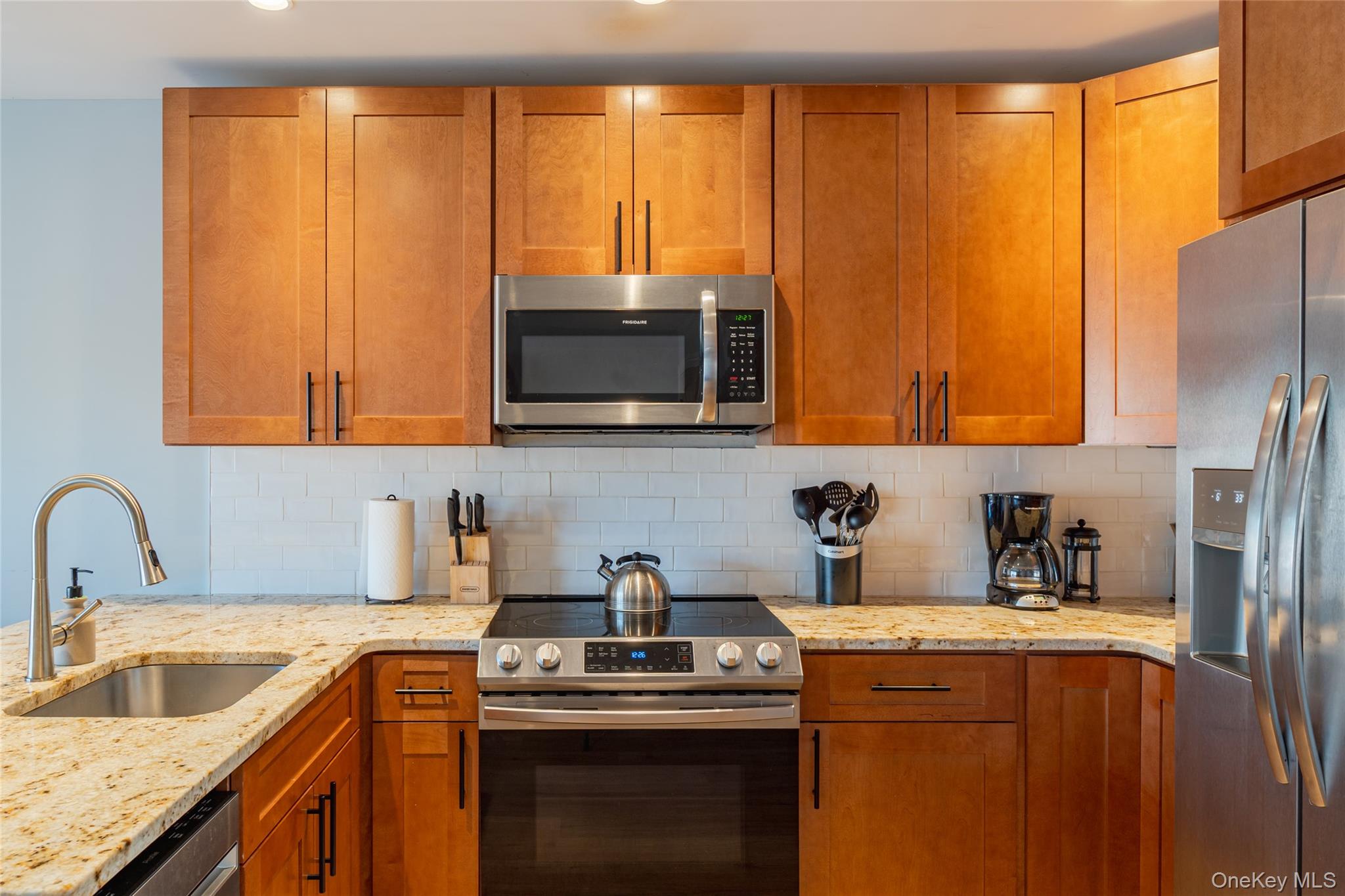 71 County Road 65, Unit 6 Windham, NY 12439 - Photo 5 of 38 a kitchen with stainless steel appliances a sink a refrigerator and a sink
