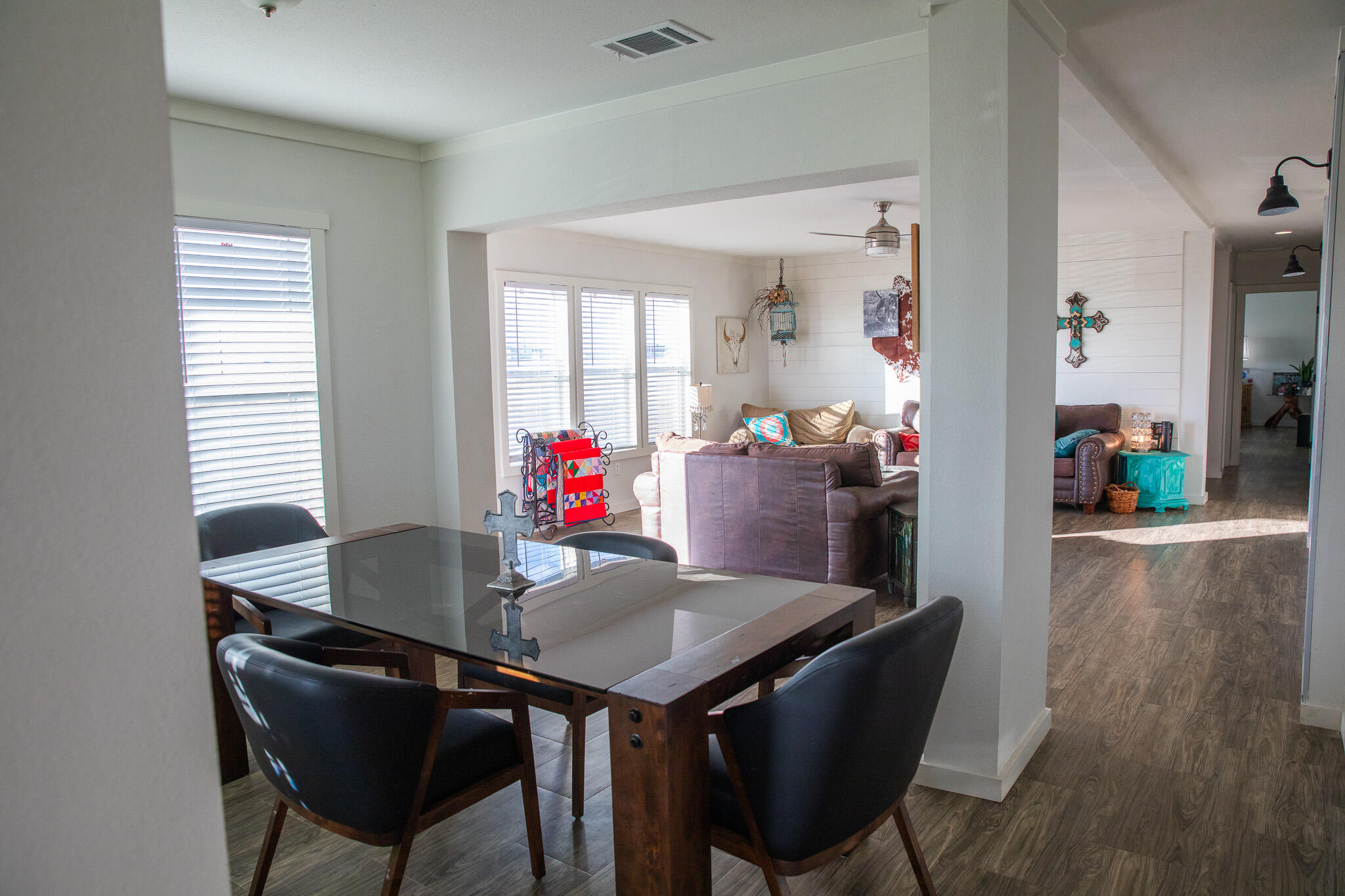 1388 Mallard Road Wilson, TX 79381 - Photo 12 of 45 a view of a dining room with furniture and wooden floor