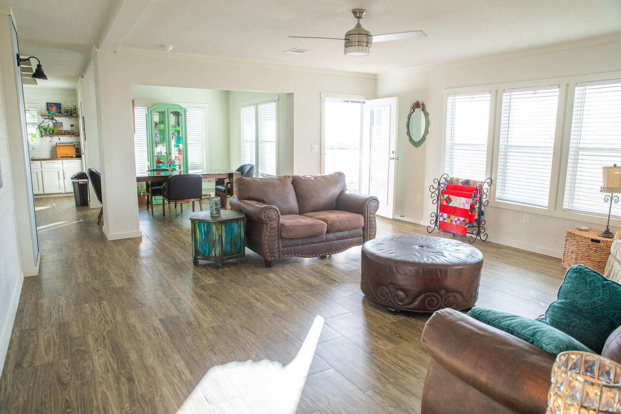 1388 Mallard Road Wilson, TX 79381 - Photo 18 of 45 a living room with furniture and a wooden floor