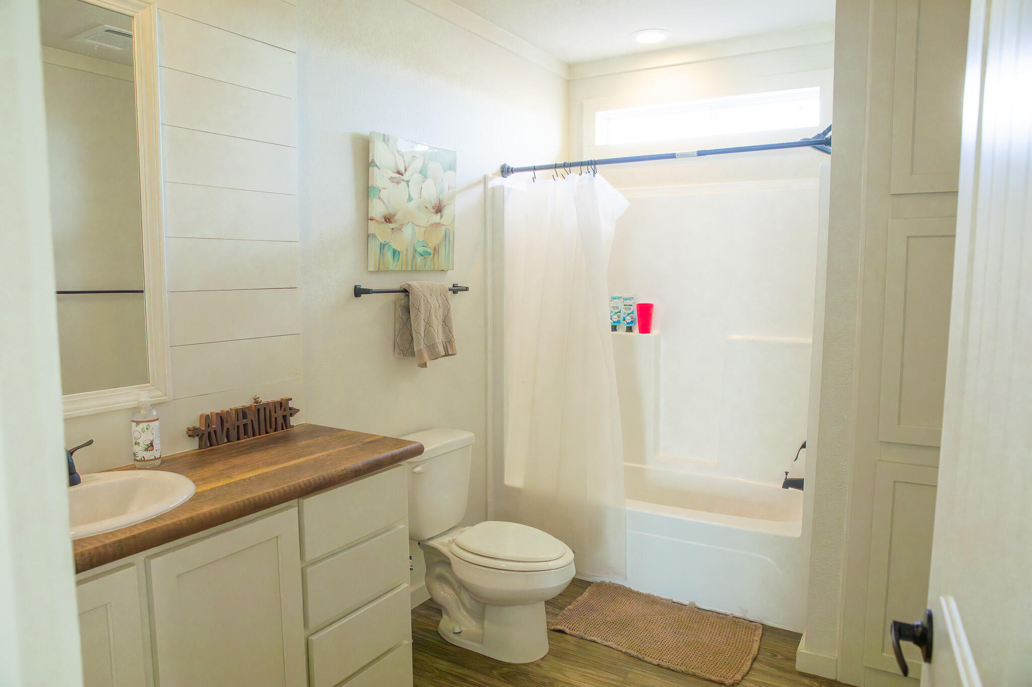 1388 Mallard Road Wilson, TX 79381 - Photo 20 of 45 a bathroom with a sink toilet and shower