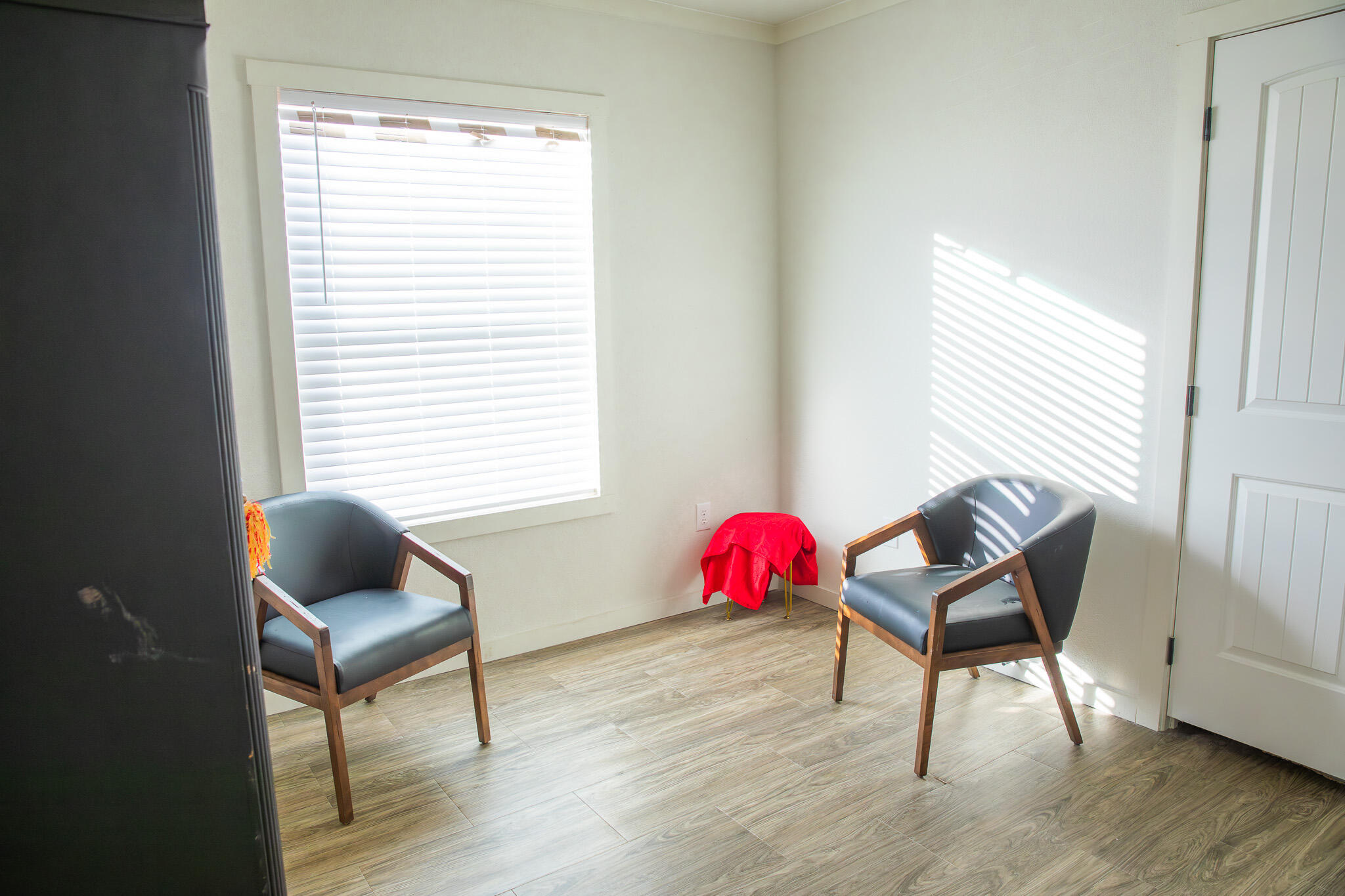 1388 Mallard Road Wilson, TX 79381 - Photo 23 of 45 a living room with furniture and wooden floor
