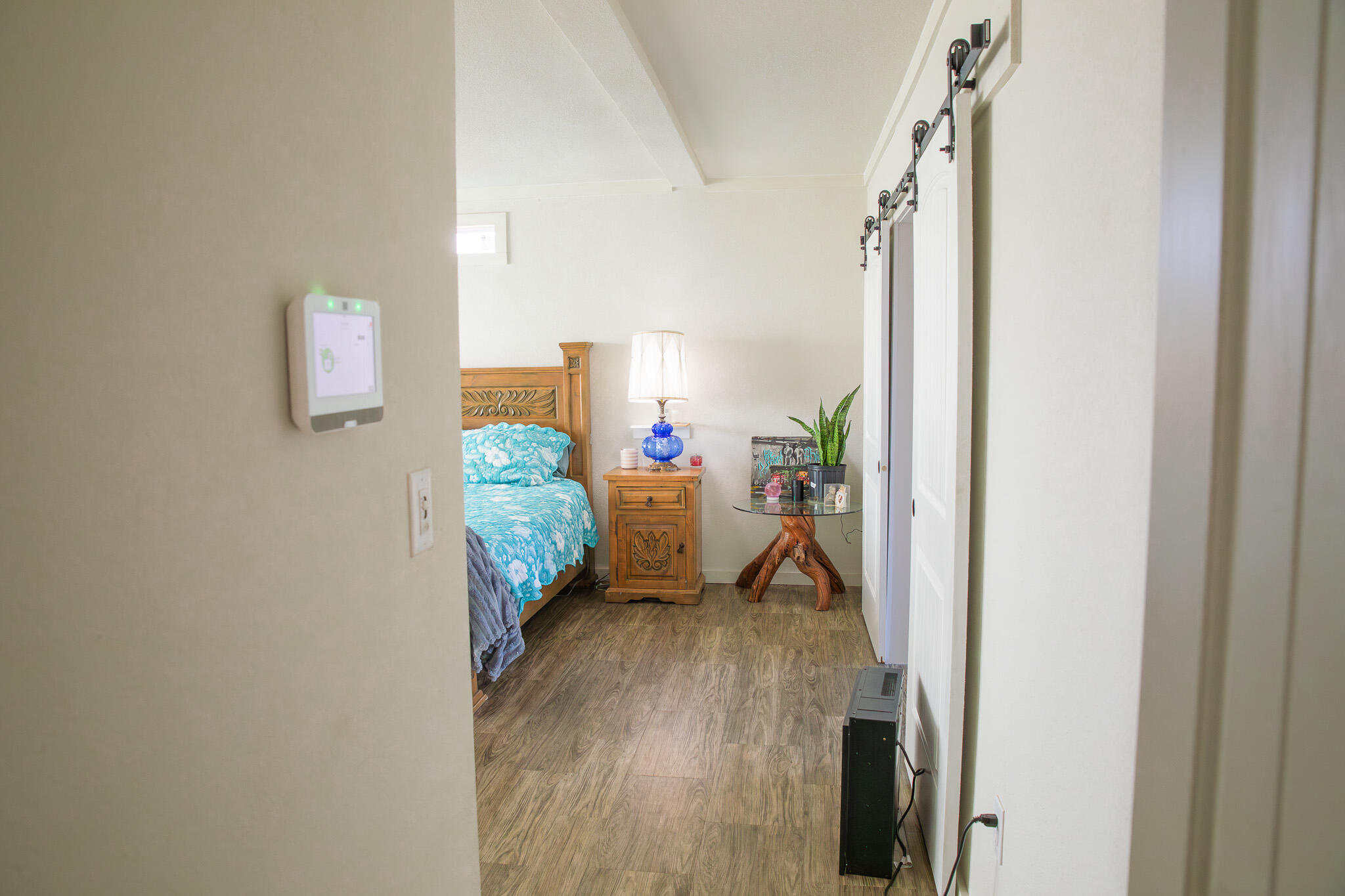 1388 Mallard Road Wilson, TX 79381 - Photo 24 of 45 a living room with furniture and a wooden floor