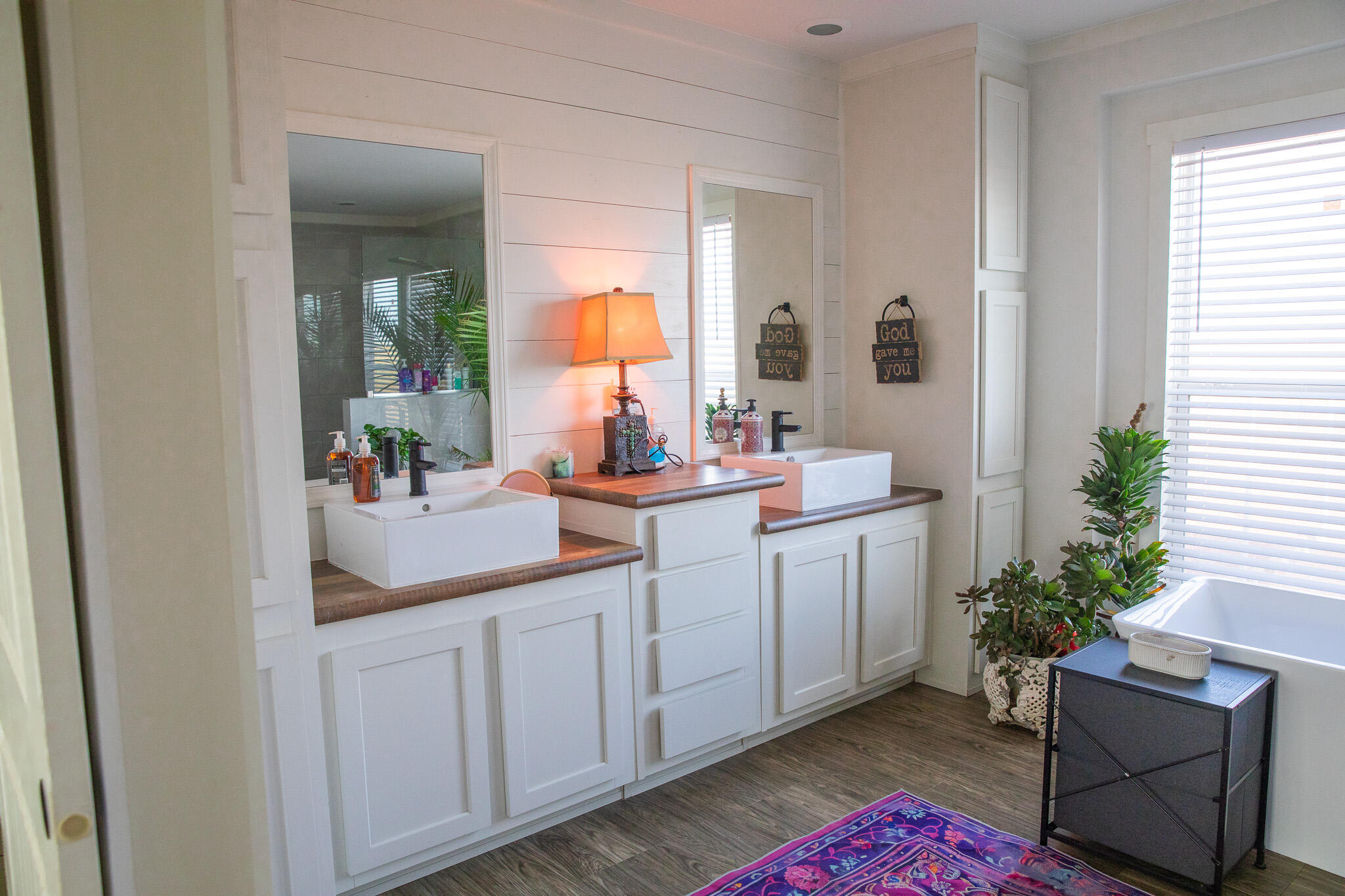 1388 Mallard Road Wilson, TX 79381 - Photo 29 of 45 a en suite bathroom with a sink and a mirror
