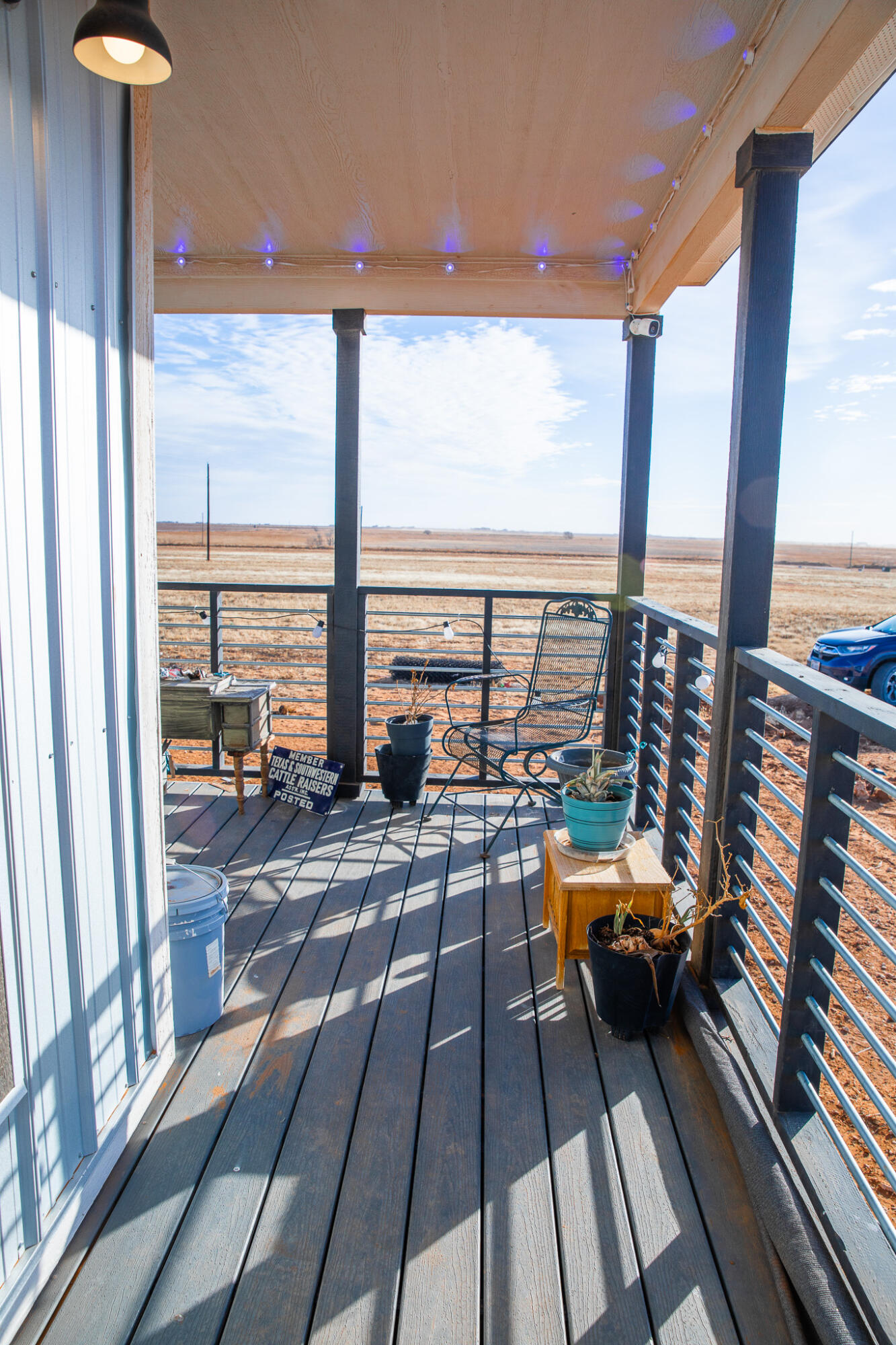 1388 Mallard Road Wilson, TX 79381 - Photo 37 of 45 a view of a balcony with wooden floor