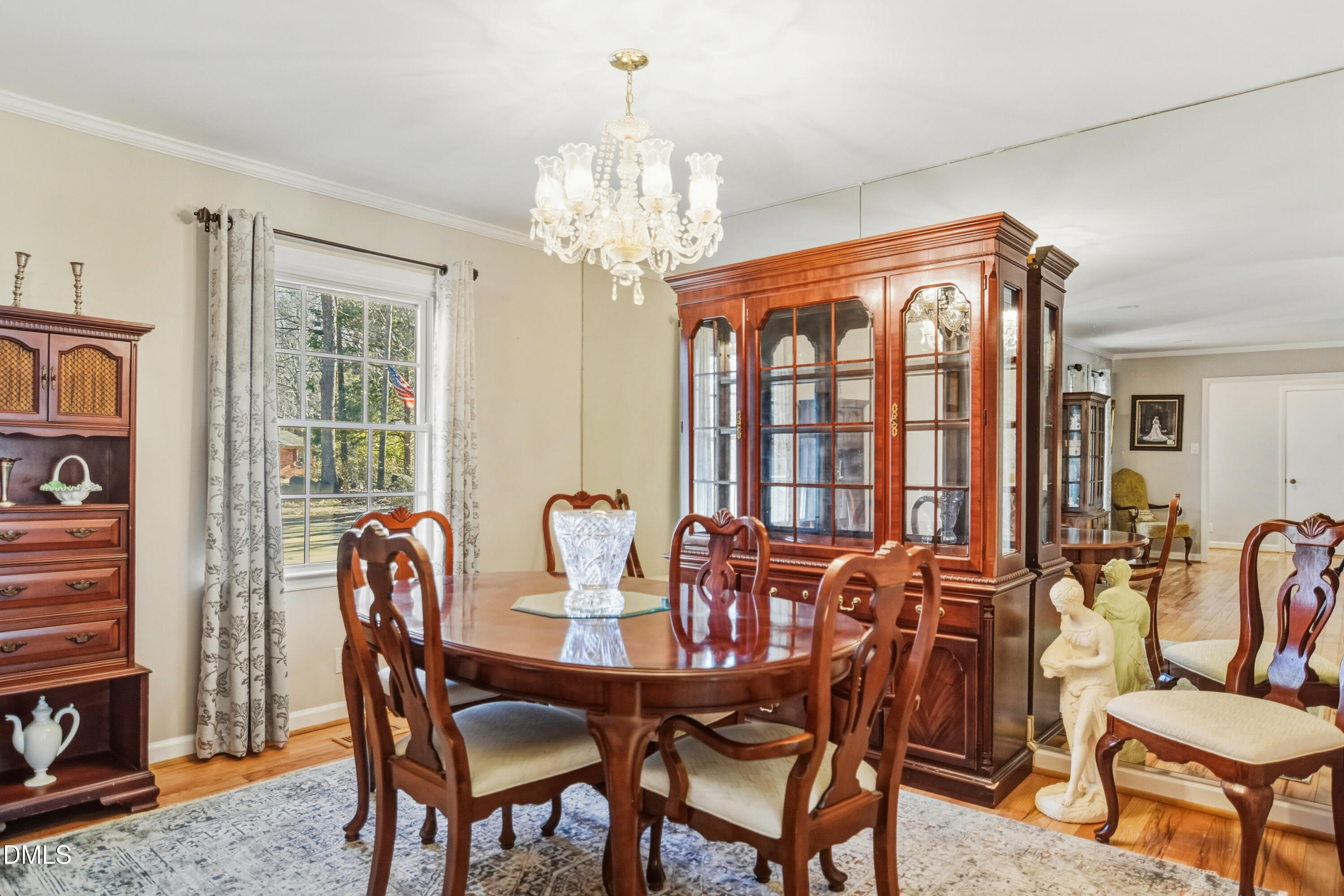 4911 Seterra Bend Durham, NC 27712 - Photo 8 of 26 a view of a dining room with furniture window and outside view