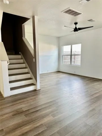 a bathroom with a sink vanity and a mirror
