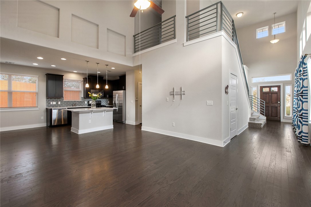 a view of a kitchen with a sink cabinets and outdoor space