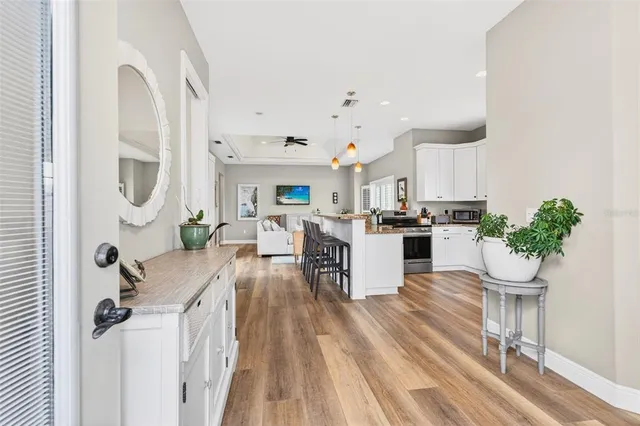 a kitchen with a table and chairs