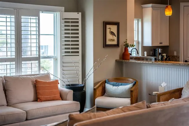 a spacious bathroom with a granite countertop sink and a mirror