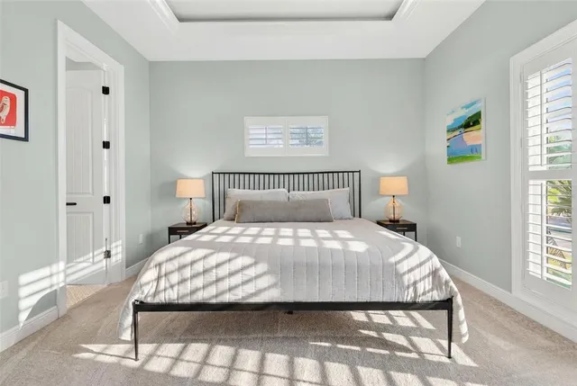 a bathroom with a toilet a sink and a mirror