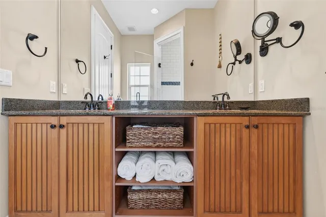 a view of storage and utility room with stairs