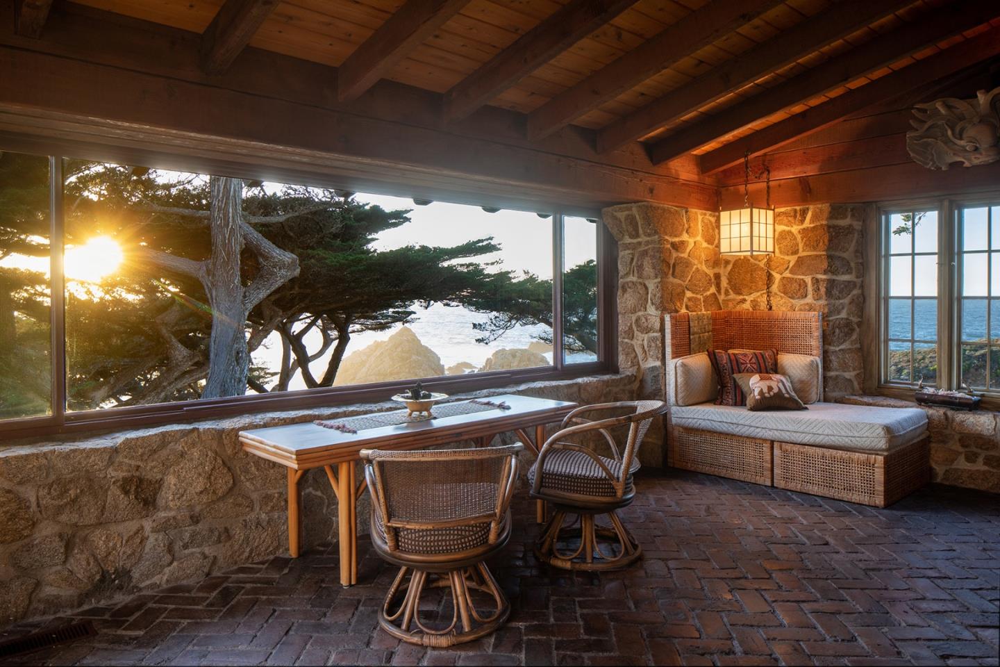 171 Spindrift Road Carmel, CA 93923 - Photo 19 of 37 a roof deck with table and chairs and wooden floor