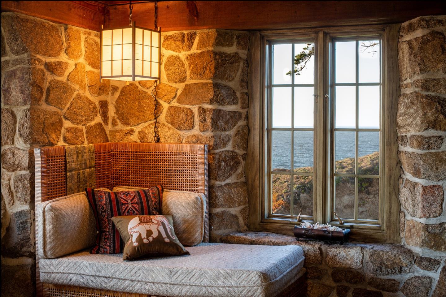 171 Spindrift Road Carmel, CA 93923 - Photo 20 of 37 a bedroom with a bed and a window