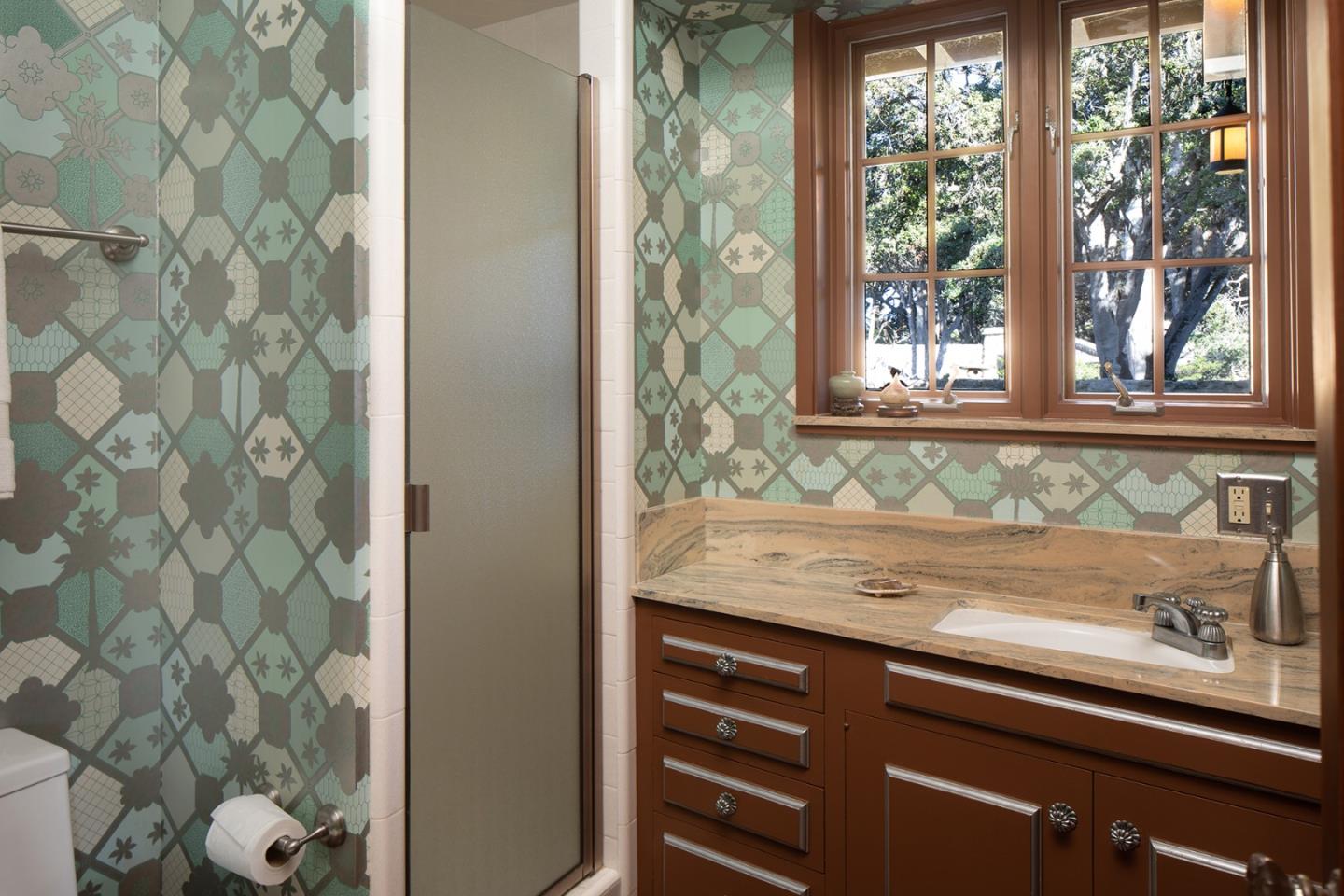 171 Spindrift Road Carmel, CA 93923 - Photo 27 of 37 a view of a sink and a mirror