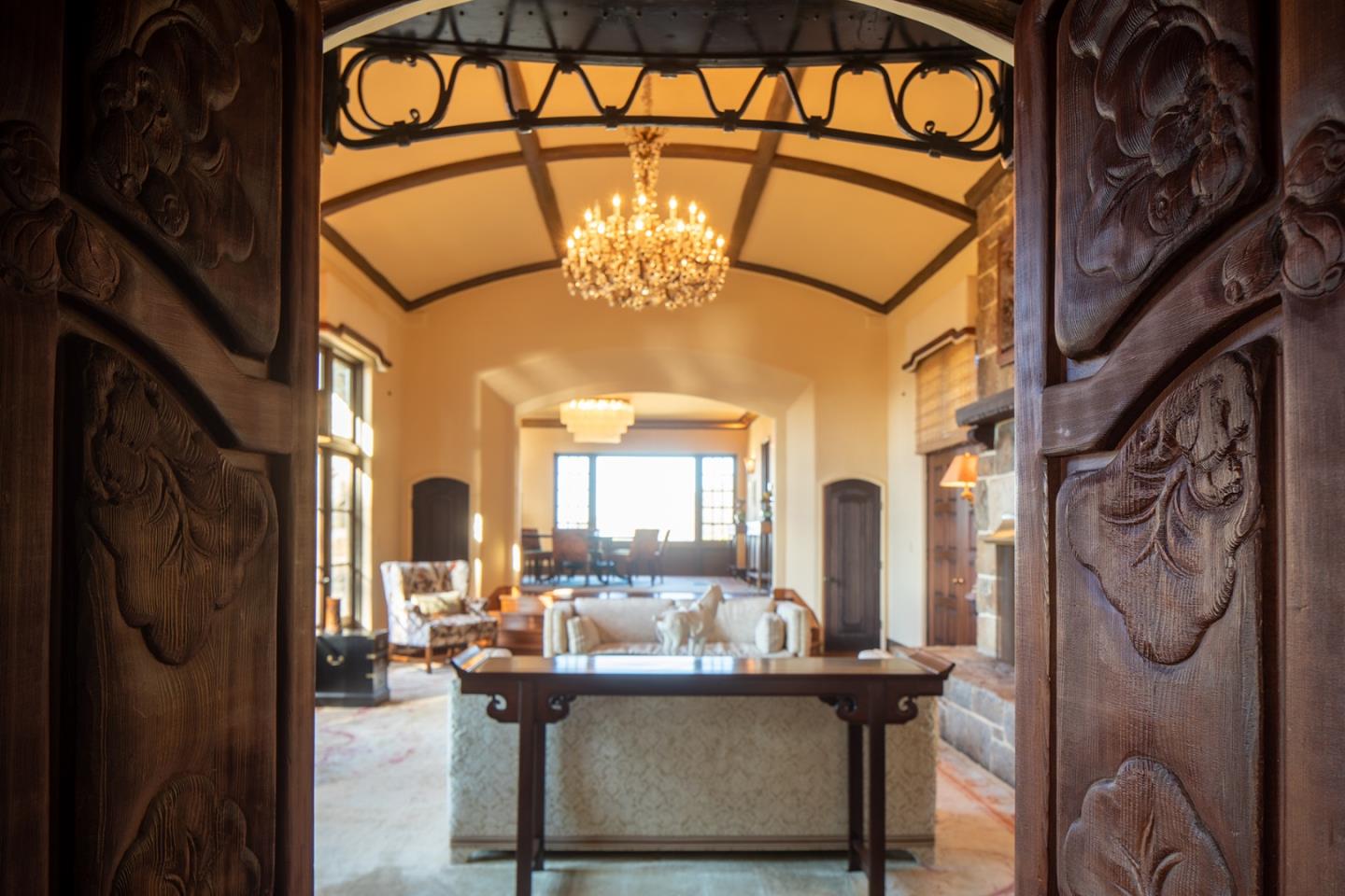 171 Spindrift Road Carmel, CA 93923 - Photo 30 of 37 a view of living room with furniture and a chandelier