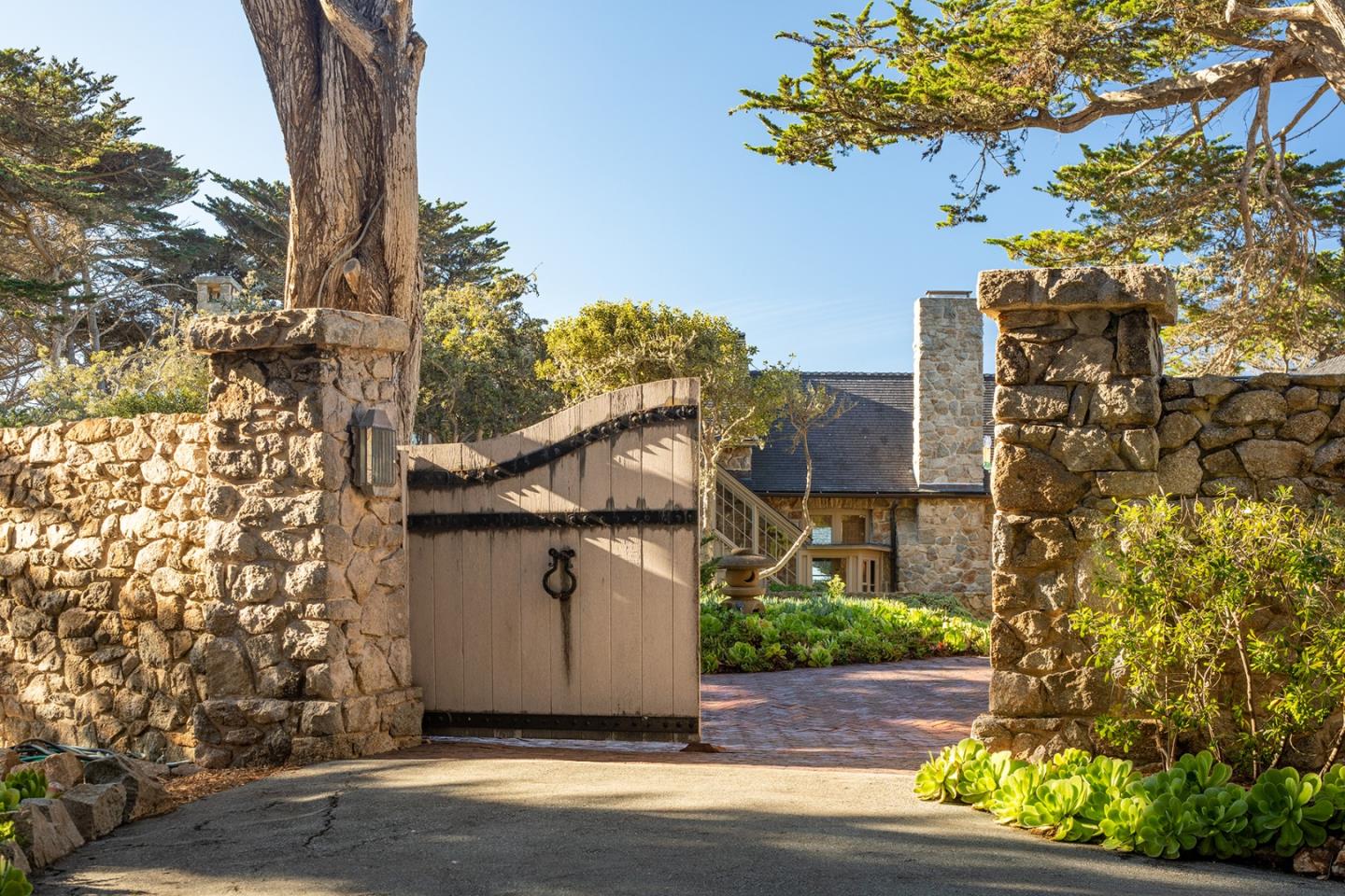 171 Spindrift Road Carmel, CA 93923 - Photo 9 of 37 front view of a house with a street
