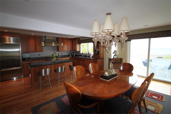 6 Gilbert Heights Road Marblehead, MA 01945 - Photo 3 of 15 a dining room with furniture a chandelier and wooden floor