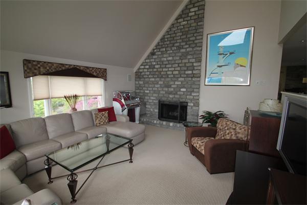 6 Gilbert Heights Road Marblehead, MA 01945 - Photo 4 of 15 a living room with furniture and a fireplace