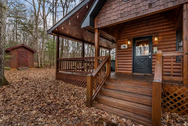 a view of entryway with wooden stairs