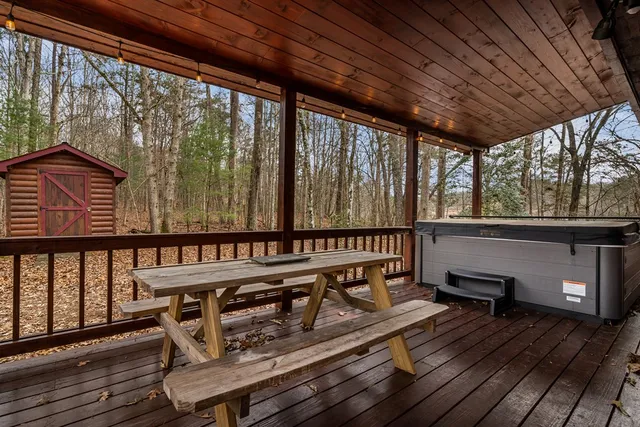 a view of a balcony with wooden floor